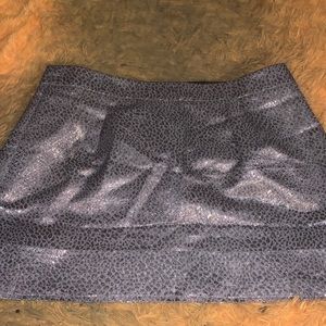 Silver shiny cheetah print mini skirt. Size 12. perfect condition!